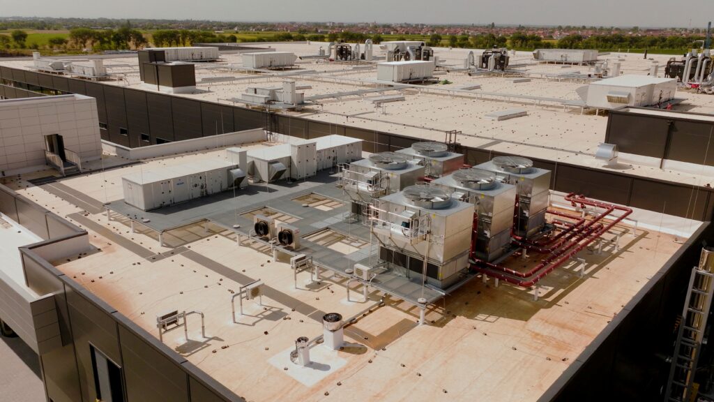 Large commercial rooftop HVAC systems installed and serviced by Dowd Heating & Air Conditioning for efficient climate control in commercial buildings.