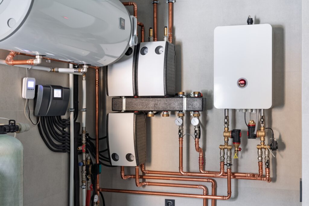 Modern residential boiler system with connected piping and heating components installed for efficient home comfort